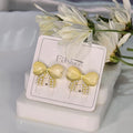 AK00048 - Golden Ribbon Bow Stud Earrings – Yellow Cat’s Eye & Pearl Accents
