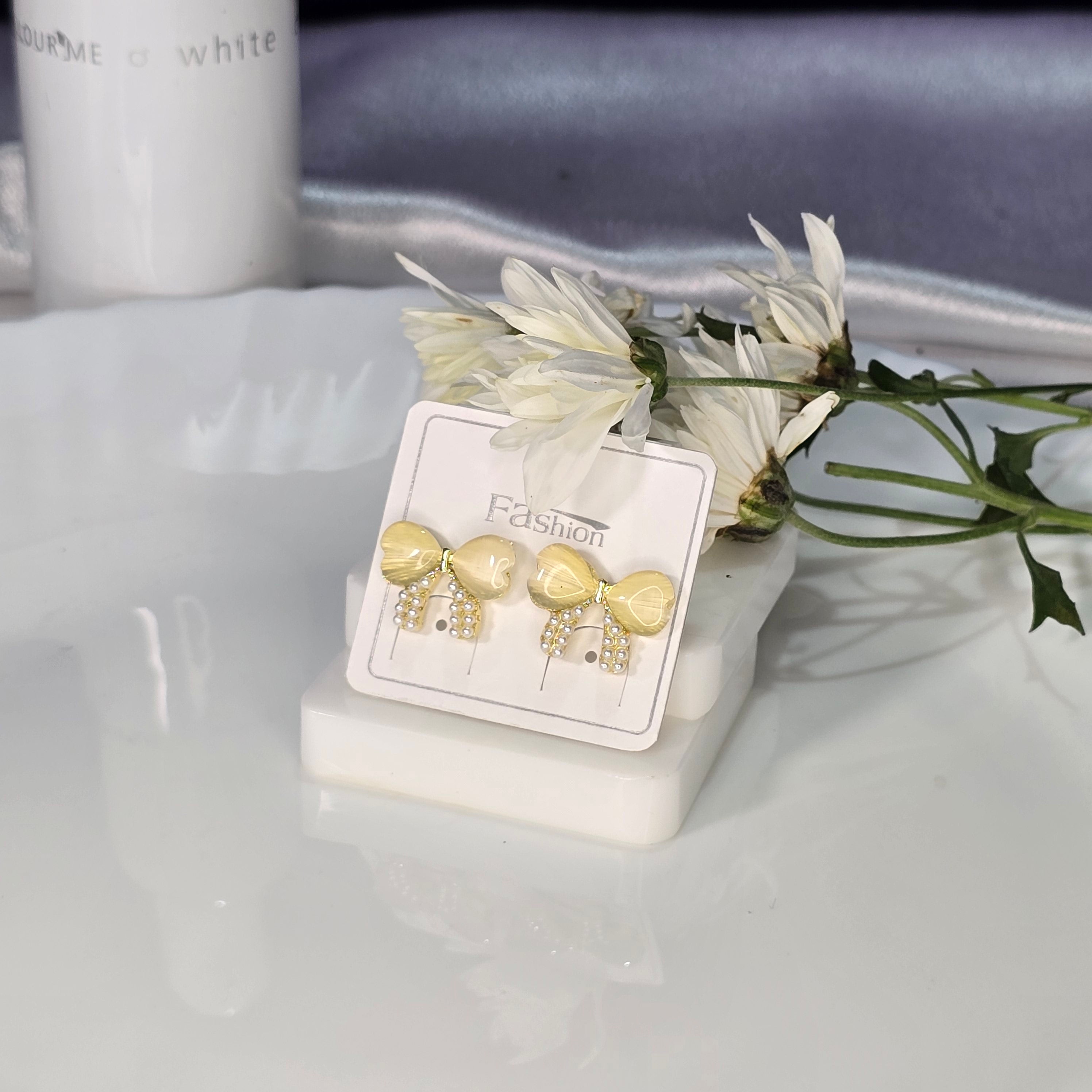 AK00048 - Golden Ribbon Bow Stud Earrings – Yellow Cat’s Eye & Pearl Accents