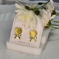 AK00050 - Golden Ribbon Heart Stud Earrings – Korean Bow Design