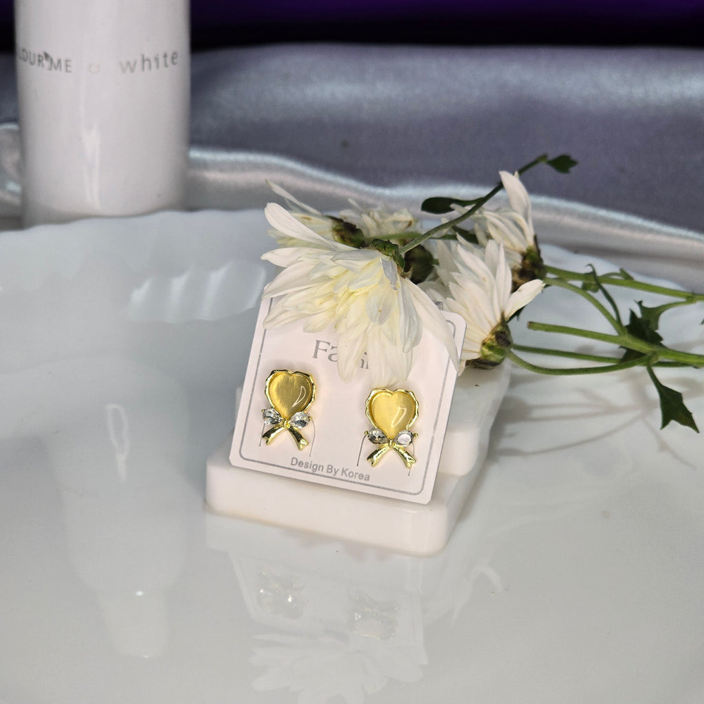 AK00050 - Golden Ribbon Heart Stud Earrings – Korean Bow Design