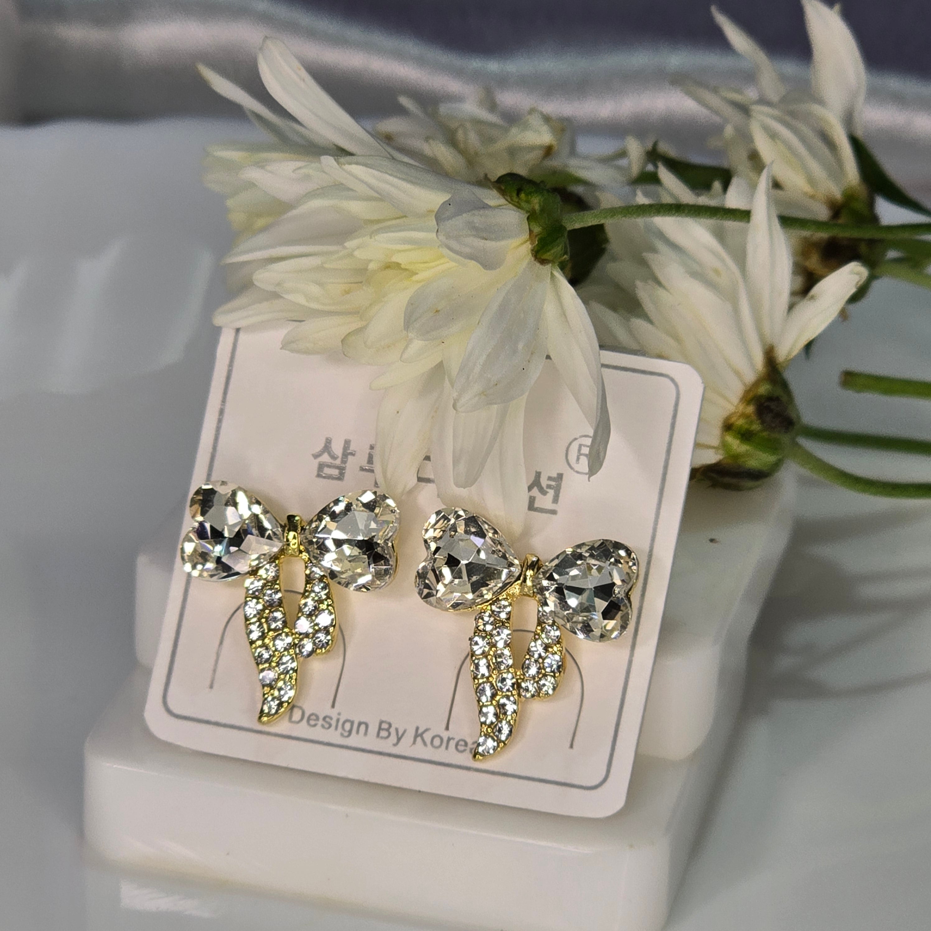 AK00066 - Sparkle Ribbon Bow Stud Earrings – Crystal Accented