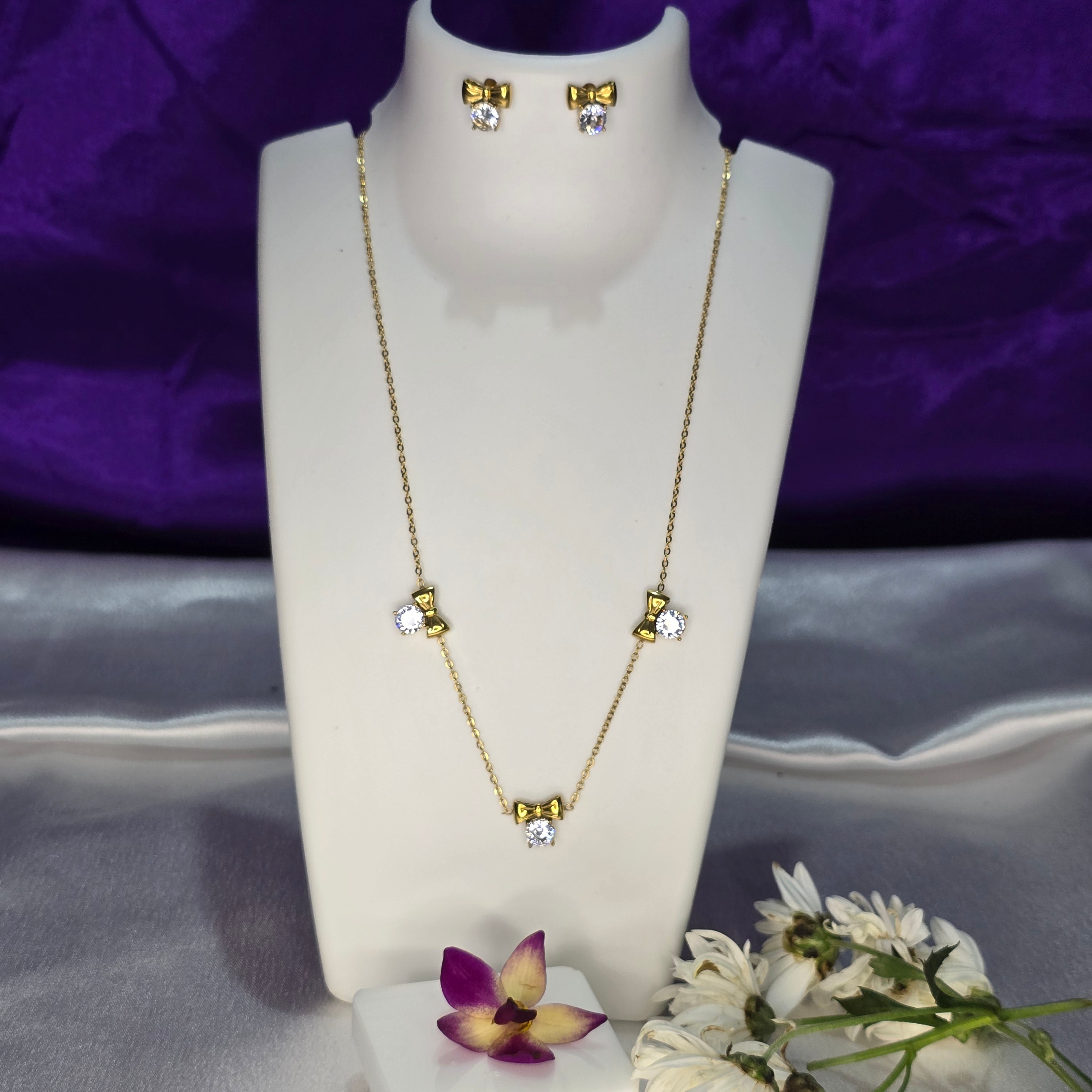 AK00085 - Aria Sparkling Bow Necklace & Earring Set