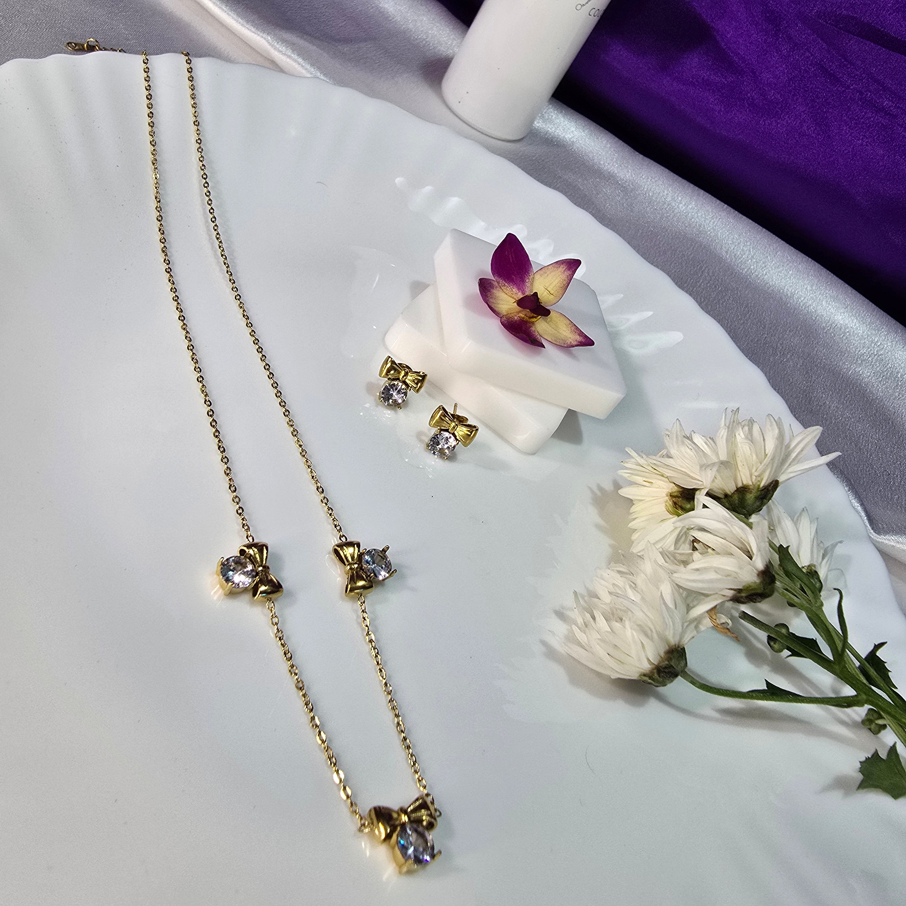 AK00085 - Aria Sparkling Bow Necklace & Earring Set
