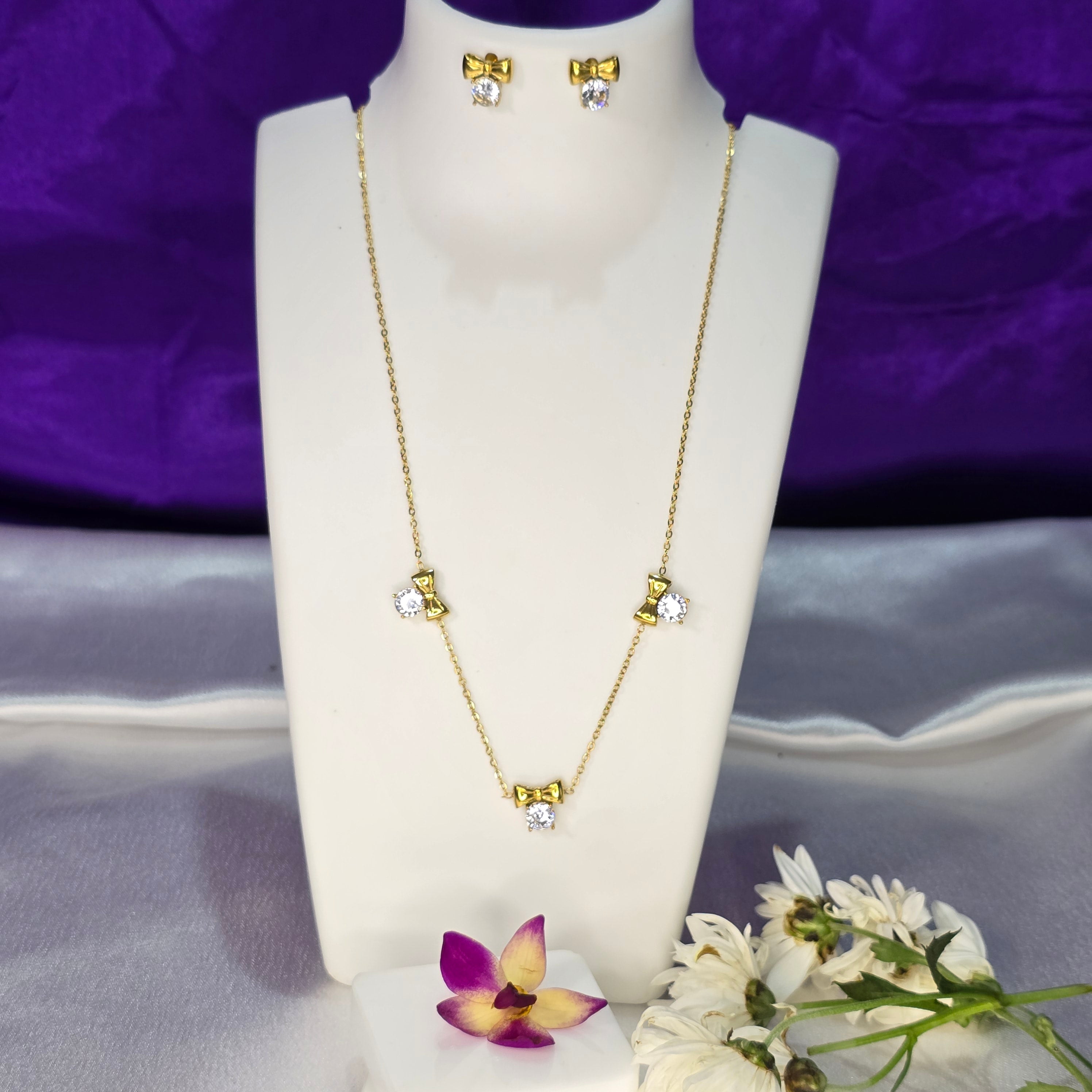 AK00085 - Aria Sparkling Bow Necklace & Earring Set