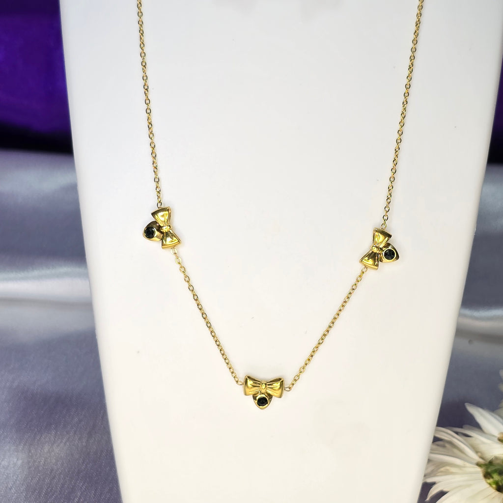 AK00085 - Aria Sparkling Bow Necklace & Earring Set