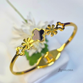 AK00156 - Elegant Black Clover & Floral Gold-Plated Bangle