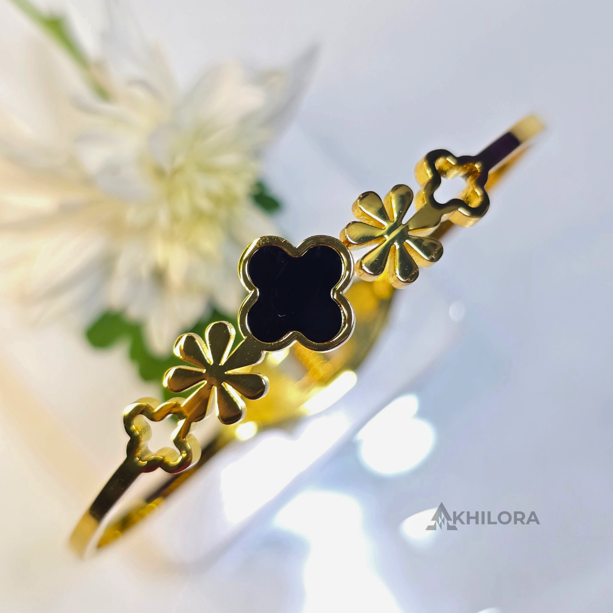 AK00156 - Elegant Black Clover & Floral Gold-Plated Bangle