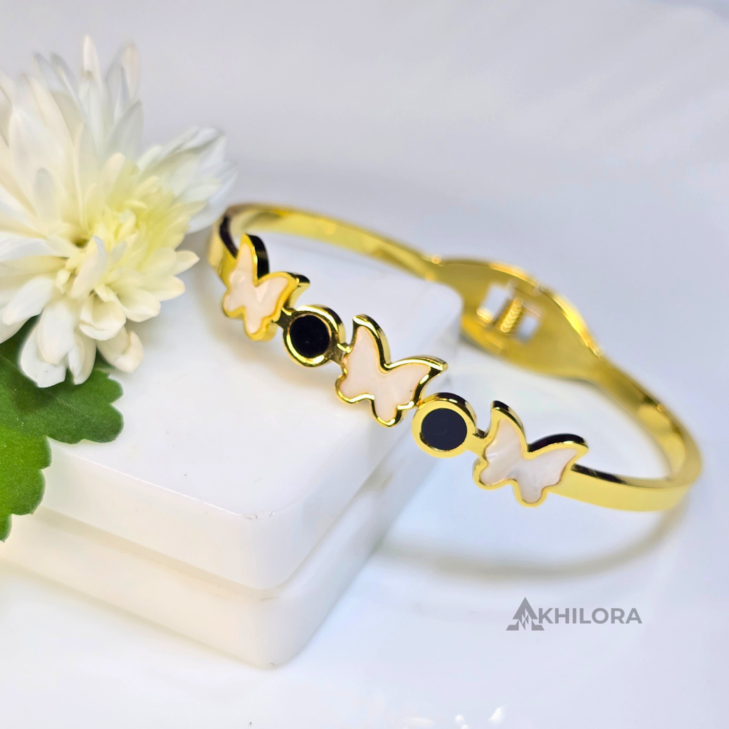 AK00159 - Whimsical Butterfly Gold-Plated Bangle with Mother-of-Pearl & Black Enamel
