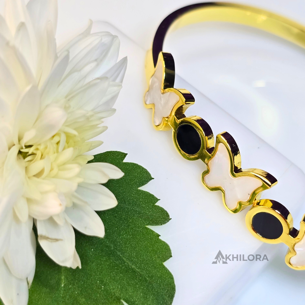 AK00159 - Whimsical Butterfly Gold-Plated Bangle with Mother-of-Pearl & Black Enamel