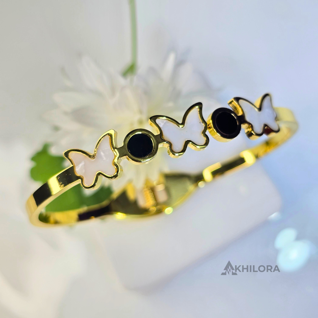 AK00159 - Whimsical Butterfly Gold-Plated Bangle with Mother-of-Pearl & Black Enamel