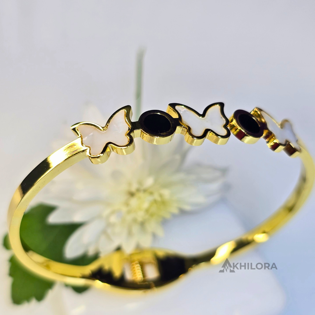 AK00159 - Whimsical Butterfly Gold-Plated Bangle with Mother-of-Pearl & Black Enamel