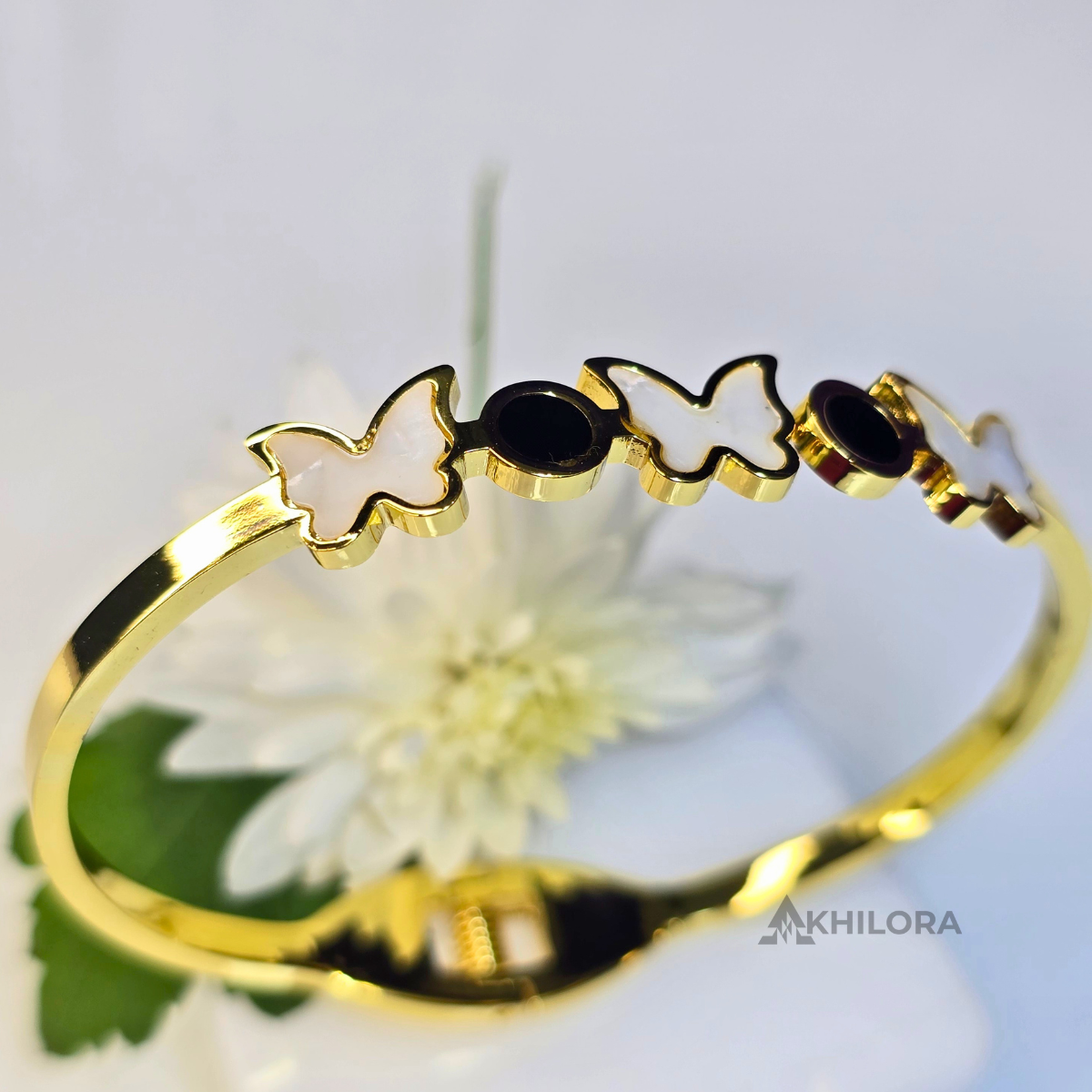 AK00159 - Whimsical Butterfly Gold-Plated Bangle with Mother-of-Pearl & Black Enamel
