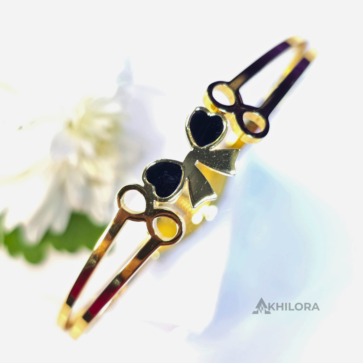 AK00164 - Chic Bowknot Gold-Plated Bangle with Black Heart Inlay