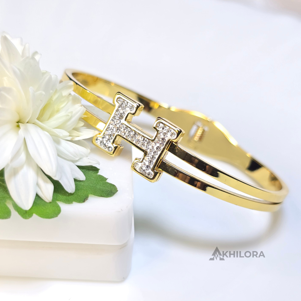 AK00166 - Crystal-Encrusted 'H' Gold-Plated Double-Band Bangle