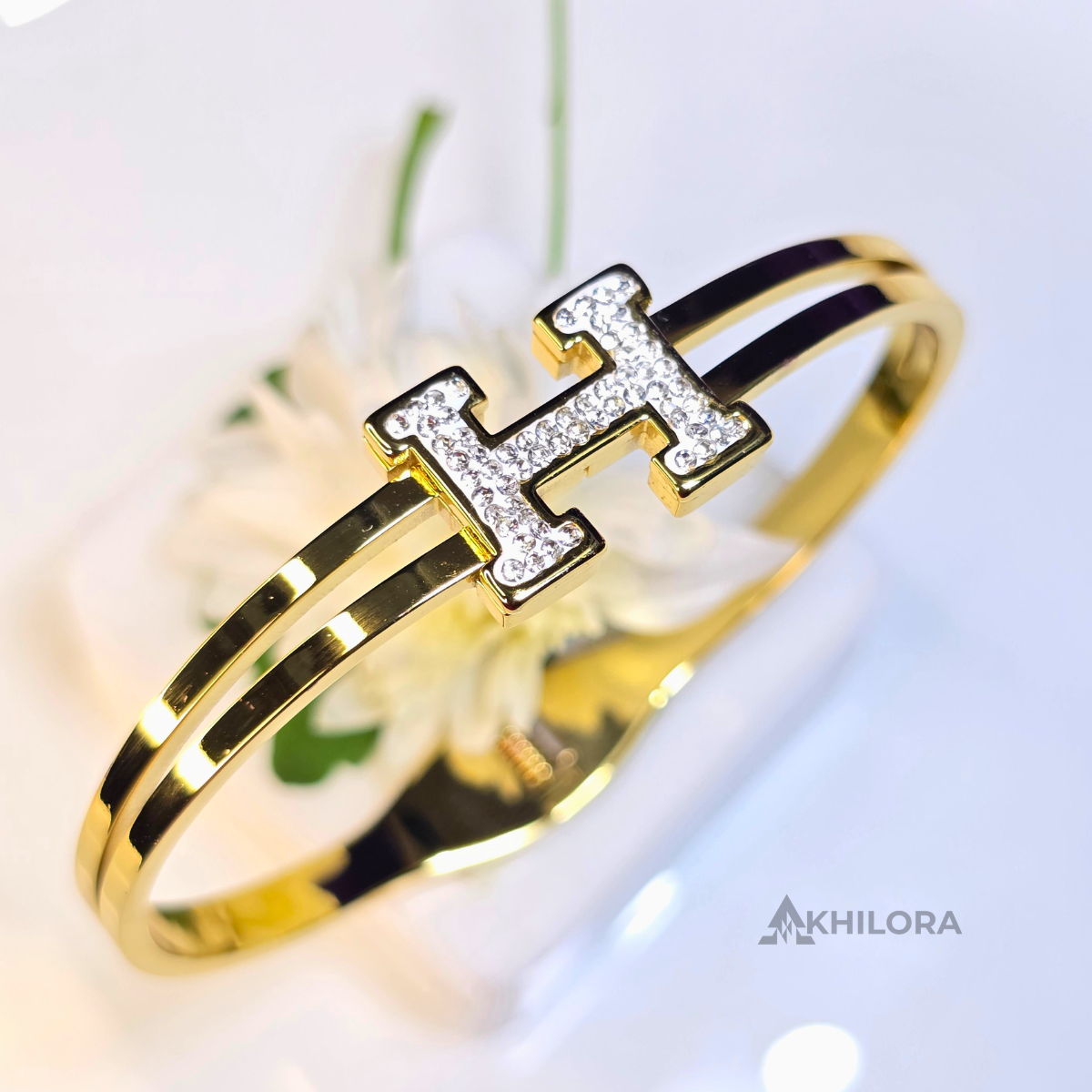 AK00166 - Crystal-Encrusted 'H' Gold-Plated Double-Band Bangle