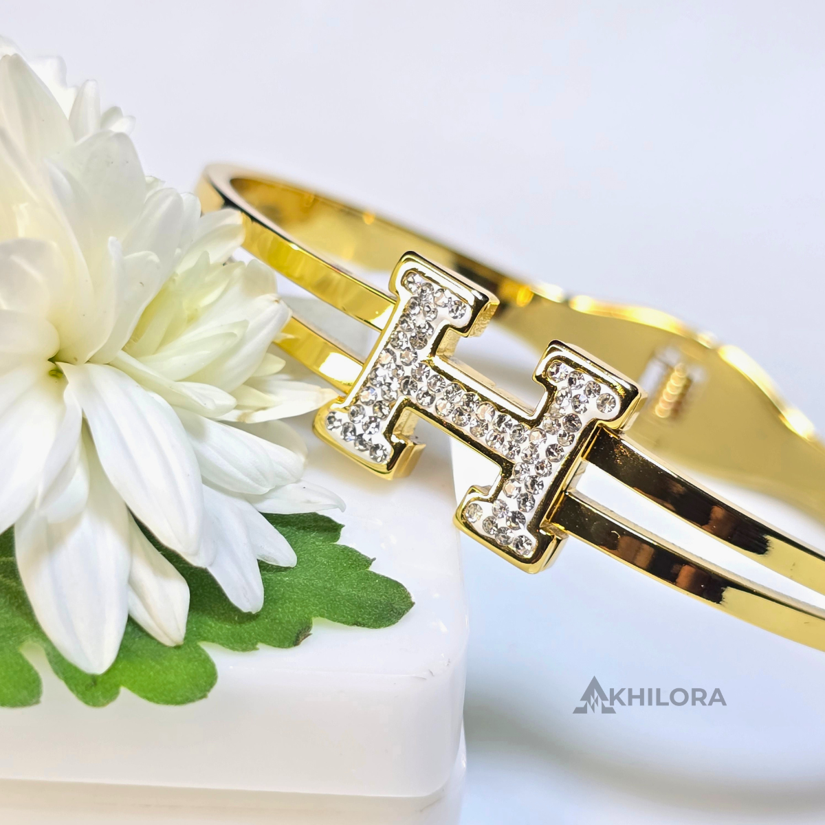 AK00166 - Crystal-Encrusted 'H' Gold-Plated Double-Band Bangle
