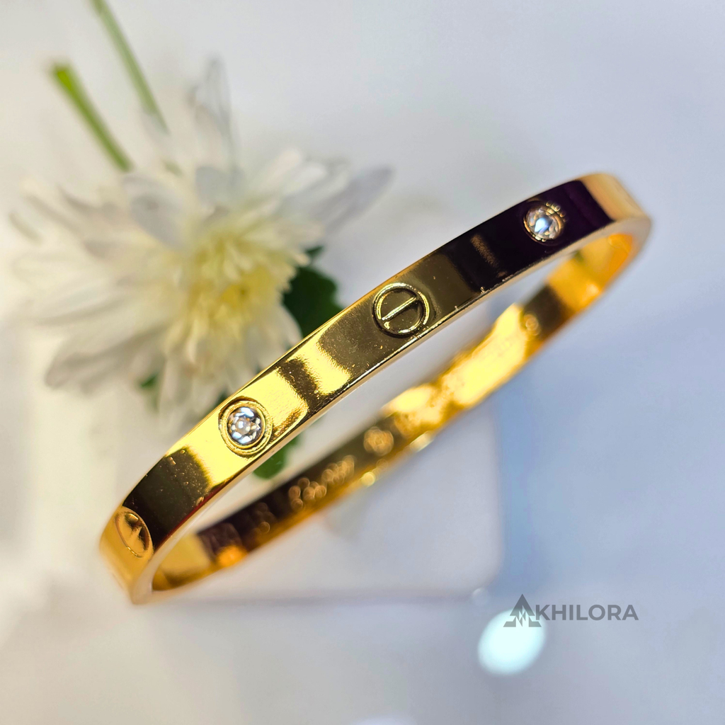 AK00171 - Iconic Screw Motif Gold-Plated Bangle with Crystal Accents