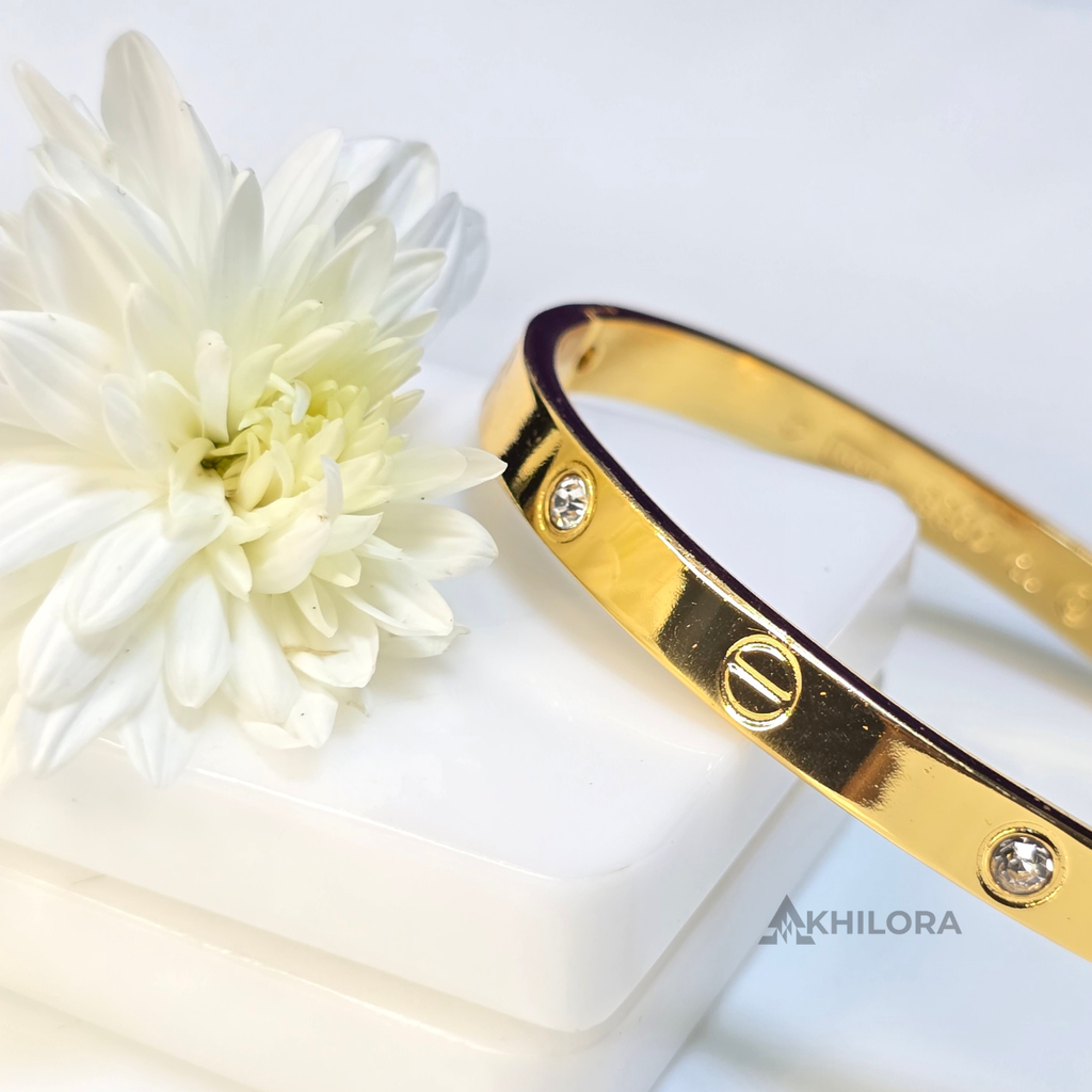 AK00171 - Iconic Screw Motif Gold-Plated Bangle with Crystal Accents