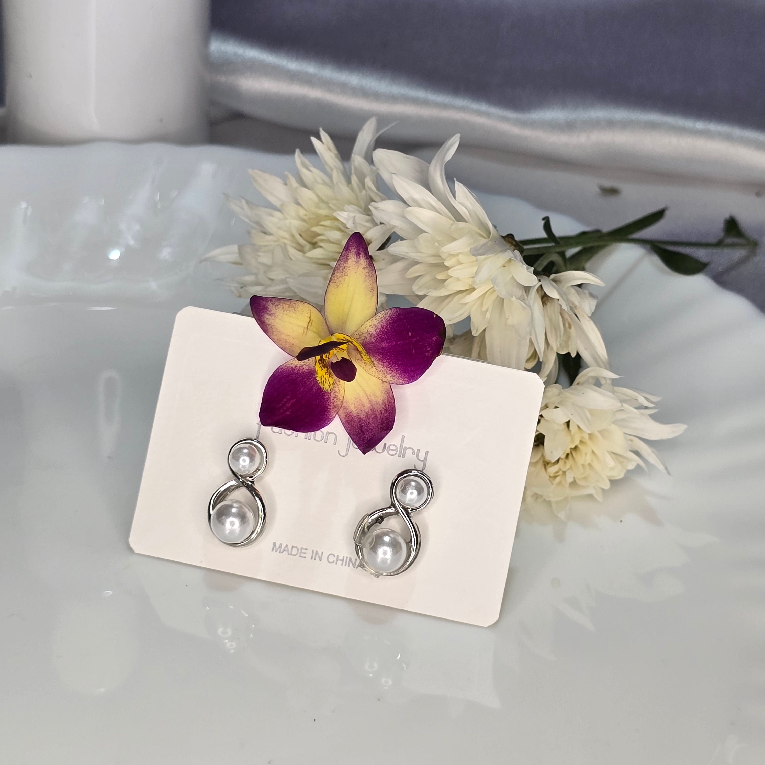 AK00080 - Silver Infinity Twist Double Pearl Stud Earrings